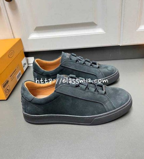 TODS 25 한정판 소가죽 카프스킨 운동화 B4333