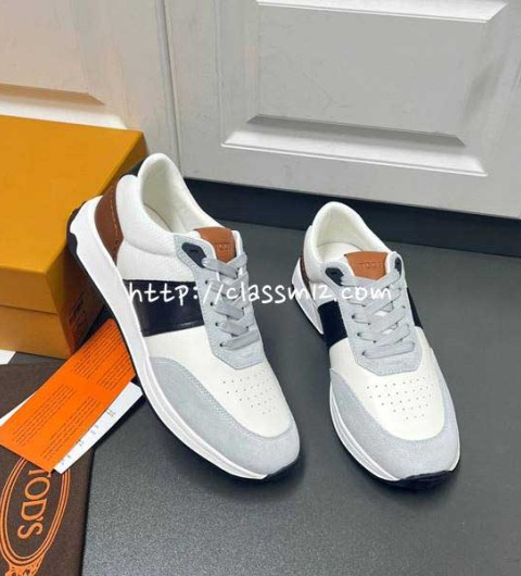 TODS 25 한정판 소가죽 카프스킨 운동화 B4335